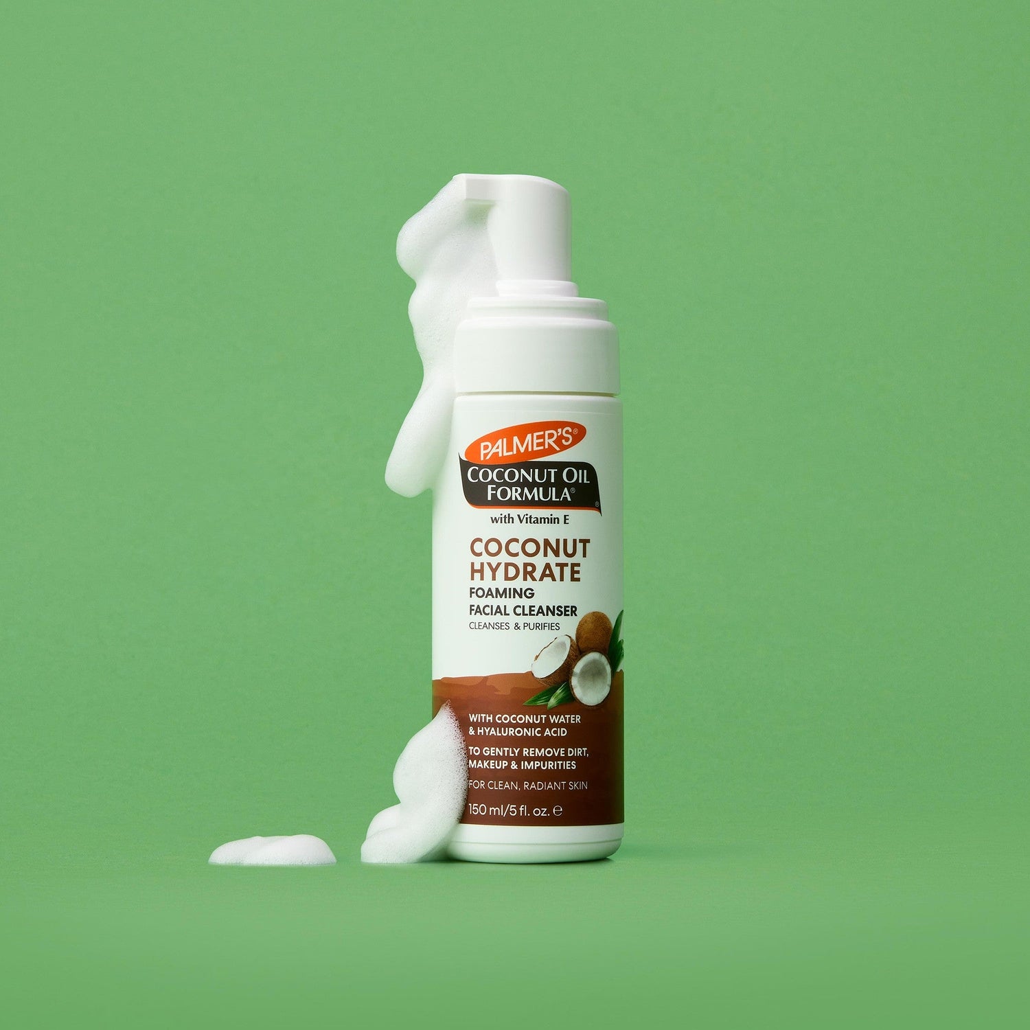 Coconut Hydrate Foaming Cleanser dispensing foam from its pump.