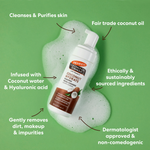 Coconut Hydrate Foaming Cleanser amidst foamy bubbles, highlighting key benefits.
